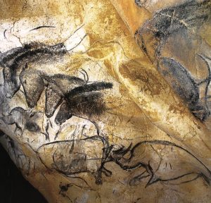 Photo représentant des peintures rupestres de chevaux réalisées dans la Grotte Chauvet.