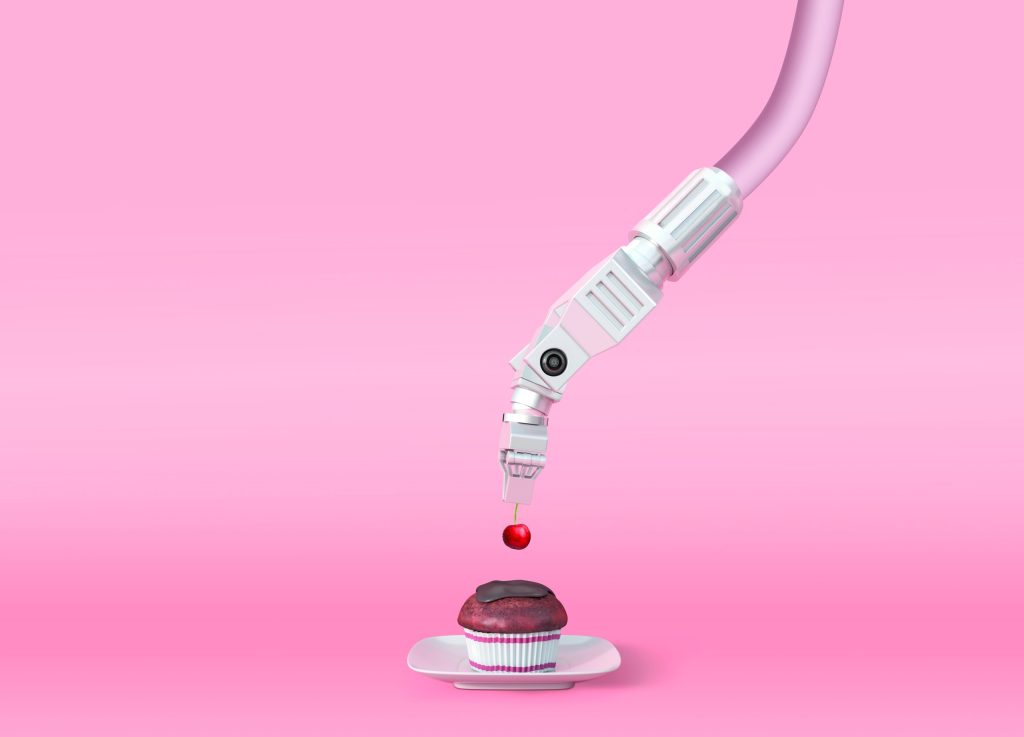 Illustration représentant un bras robotique technique saisissant une cerise et la déposant sur un cupcake